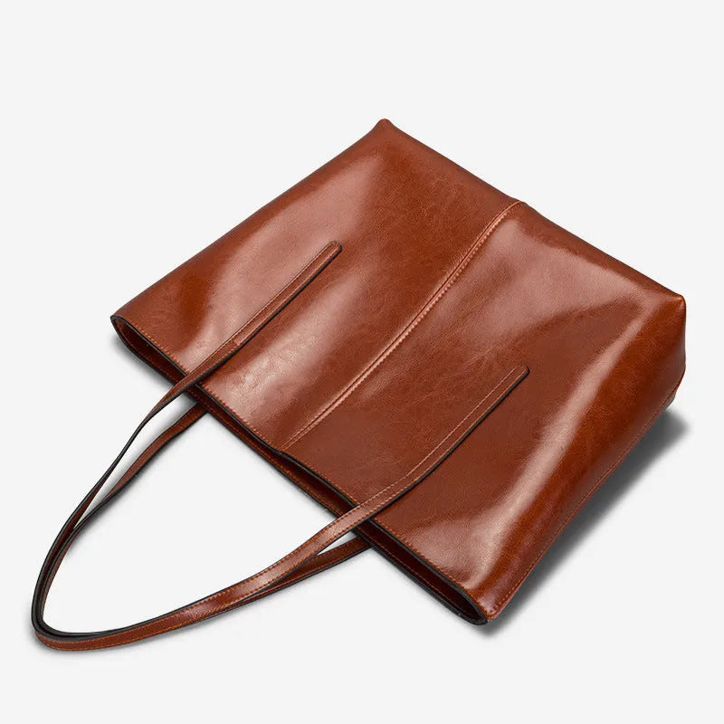 Genuine leather women's shoulder bag in retro style with multiple internal compartments and slit outer pocket