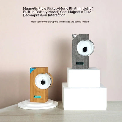 Mesmerizing ferrofluid speaker with dancing magnetic fluid that responds to music rhythms, creating a captivating visual display.