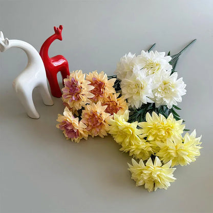 Desktop fan-shaped display holding artificial silk flowers in rose and peony varieties with colourful petals