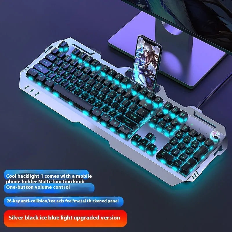 Aluminium alloy mechanical gaming keyboard with rainbow lighting, shown with a macro mouse and gaming headset.