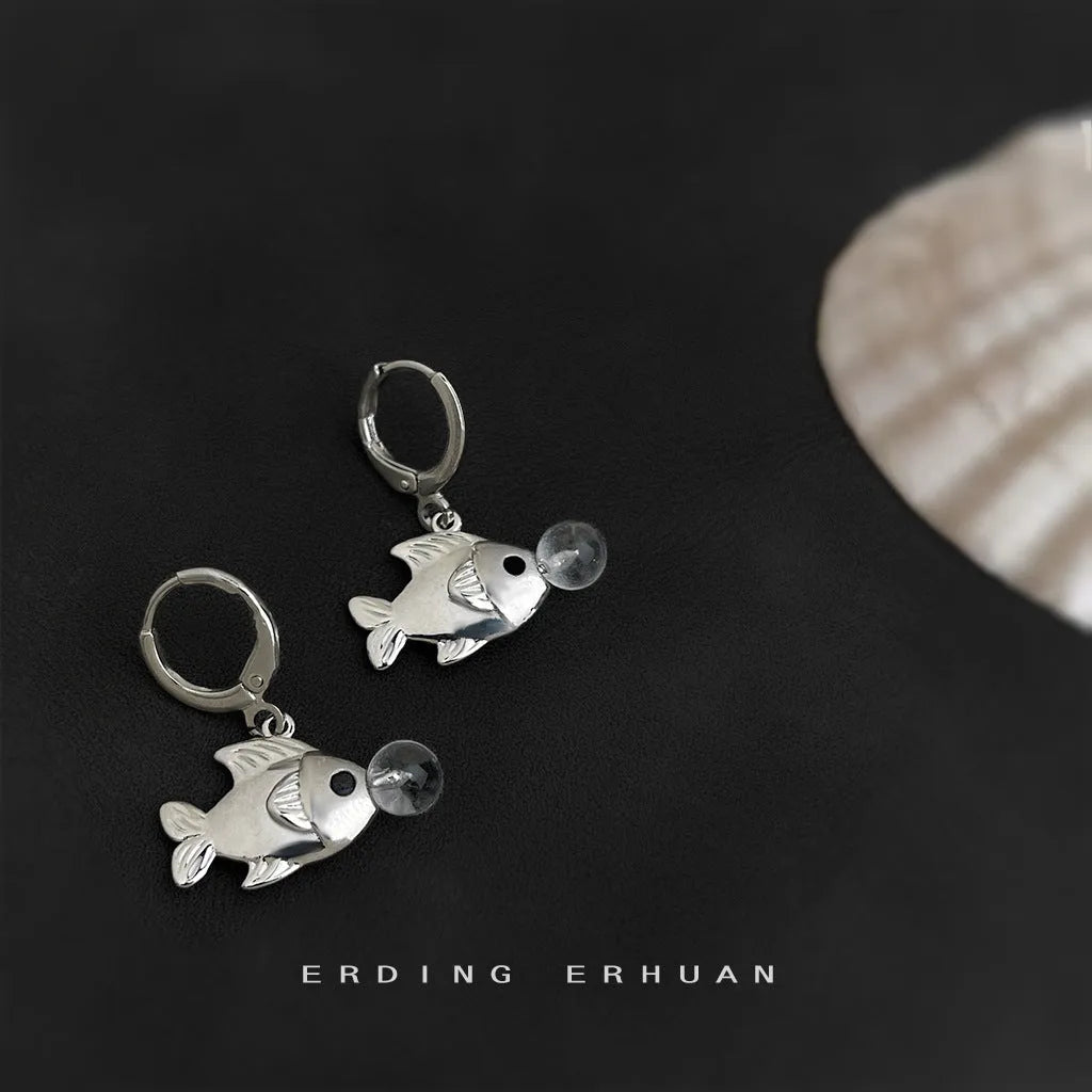 A pair of copper bubble fish earrings with electroplating, showing animal design in a sweet cool style.