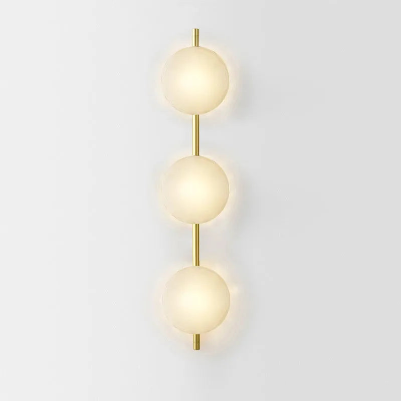 Wall-mounted bedside lamp with glass shade and iron body in various finish options