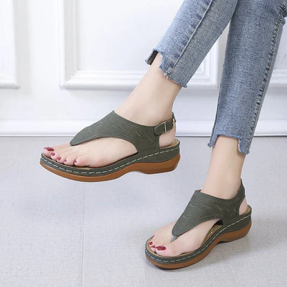 Comfortable women's wedge sandals in various colors with adjustable straps and a lightweight sole