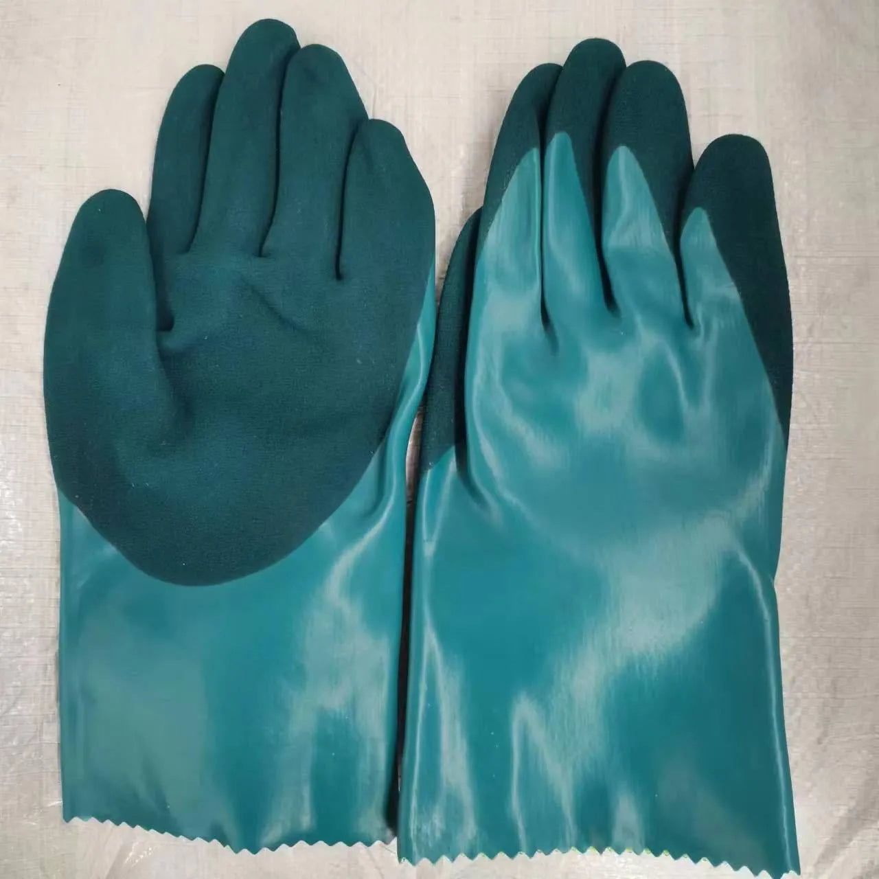 Navy blue women's lengthened nitrile gloves for waterproof fishing and marine work.