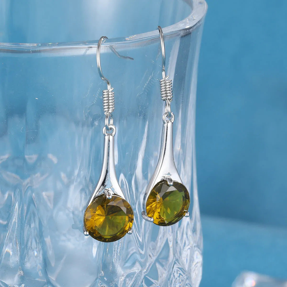 Olive green topaz earrings with water drop shape, electroplated alloy construction, and retro style for women