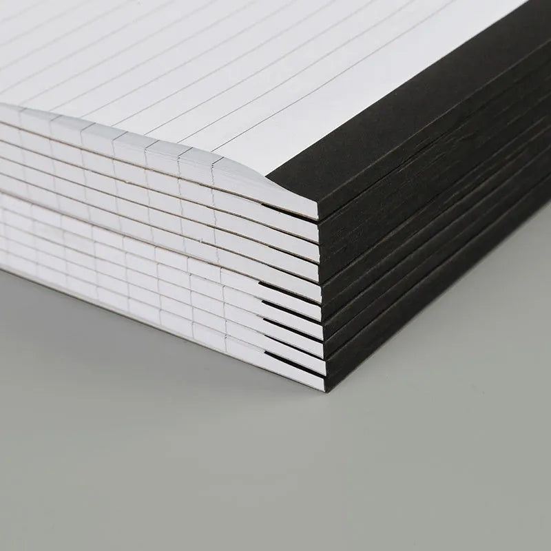A4 tearable notebook showing grid paper pages and wireless adhesive binding for clean sheet removal