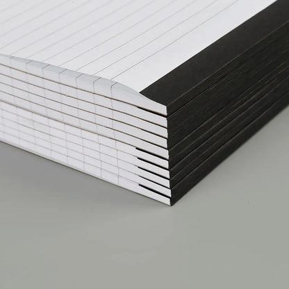 A4 tearable notebook showing grid paper pages and wireless adhesive binding for clean sheet removal