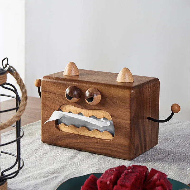 Wooden tissue box with cartoon monster design in walnut and beech colours