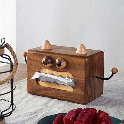Wooden tissue box with cartoon monster design in walnut and beech colours