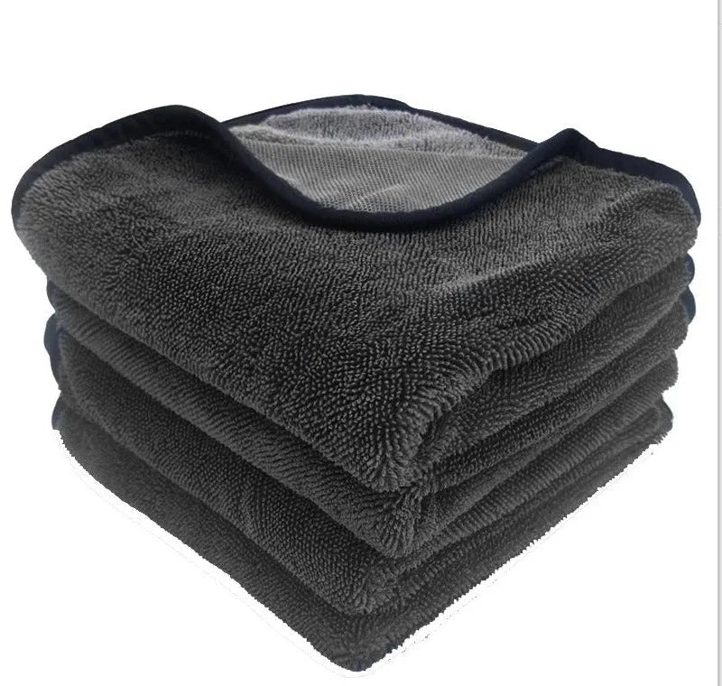 Grey car wash towel with black hemmed edge shown in multiple size options for vehicle cleaning