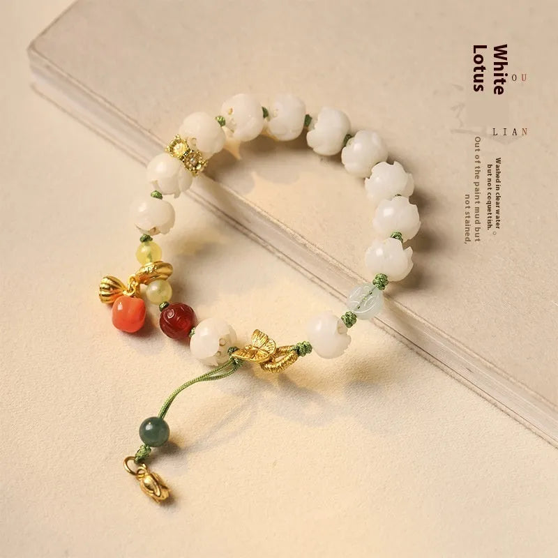 White jade Bodhi bracelet with lotus and pumpkin beads on open rope design