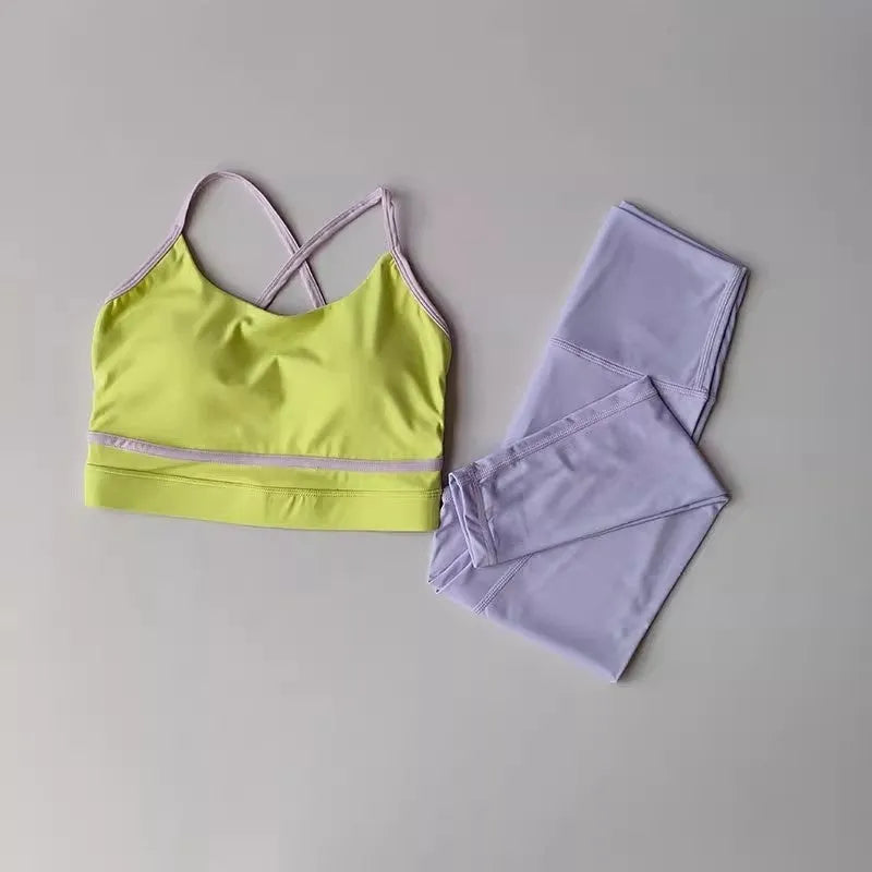 Women's blue and white sleeveless tank top and cropped yoga pants sportswear set