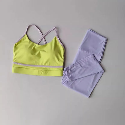 Women's blue and white sleeveless tank top and cropped yoga pants sportswear set