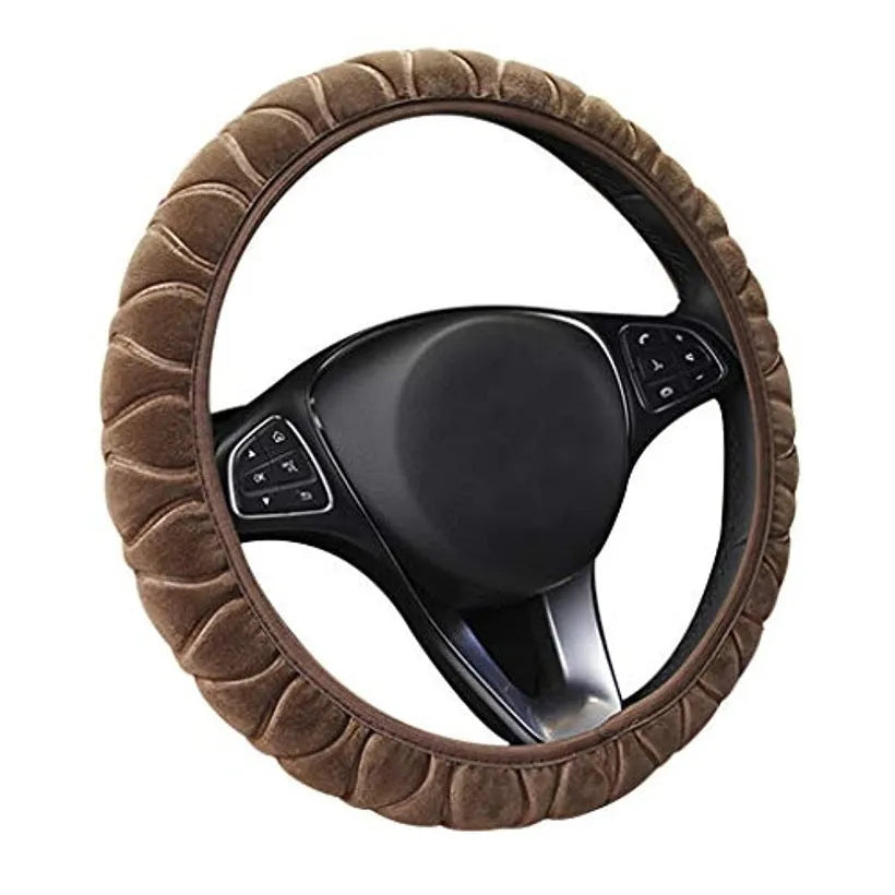 Short plush steering wheel cover in one of seven colours, fitting a 38cm steering wheel with non-slip grip