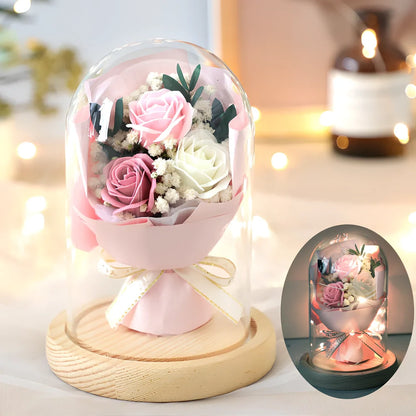 Soap flower bouquet in glass cover with red rose arrangement measuring 16cm height