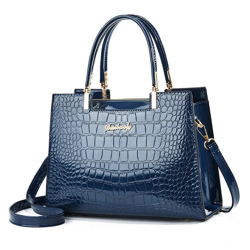 A medium-hard PU leather one-shoulder handbag in a horizontal square shape, shown in multiple colour options.