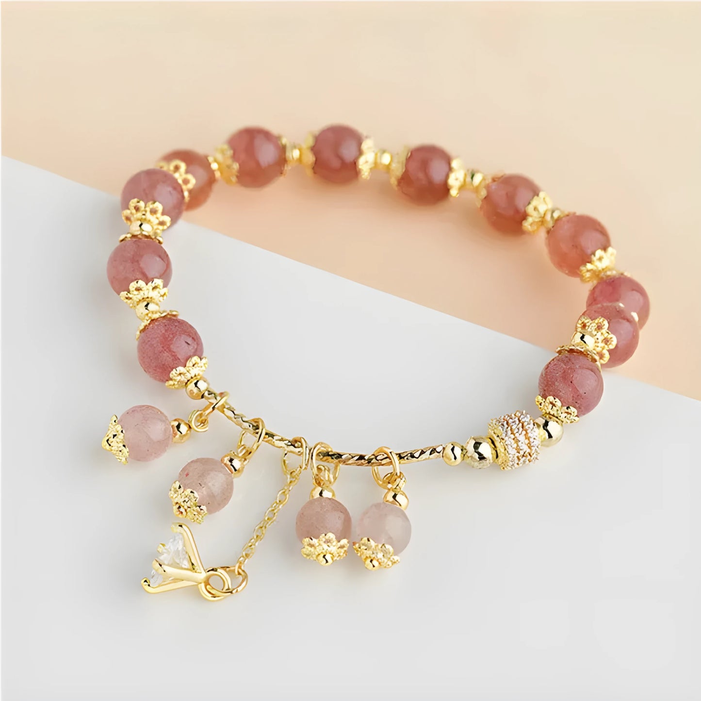 Pink heart-shaped strawberry quartz crystal bracelet with pearl accents for women