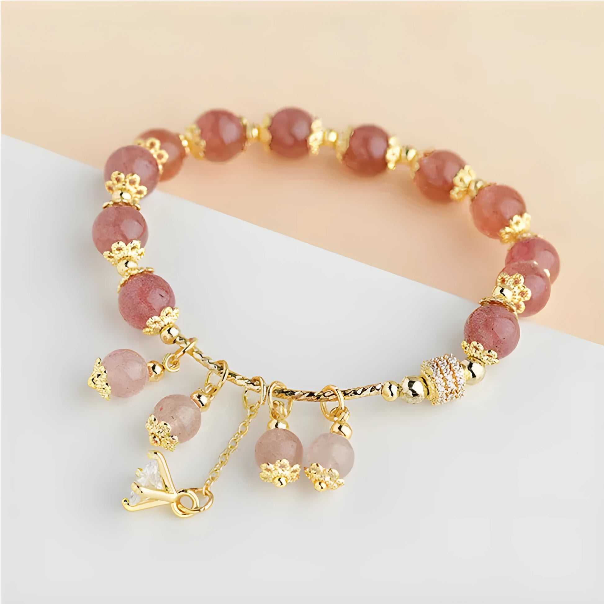 Pink heart-shaped strawberry quartz crystal bracelet with pearl accents for women