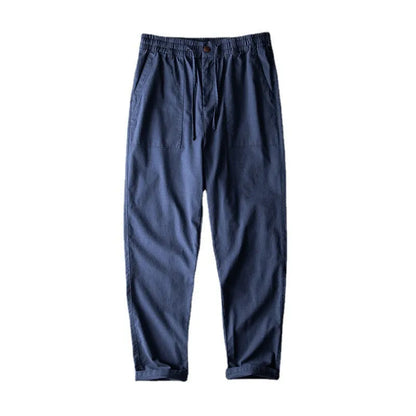 Men's solid colour linen trousers in mid-waist design available in three colours