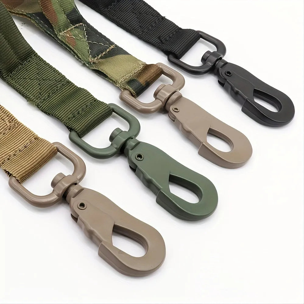 A retractable dog leash for large breeds in black, showing the handle and nylon tape.