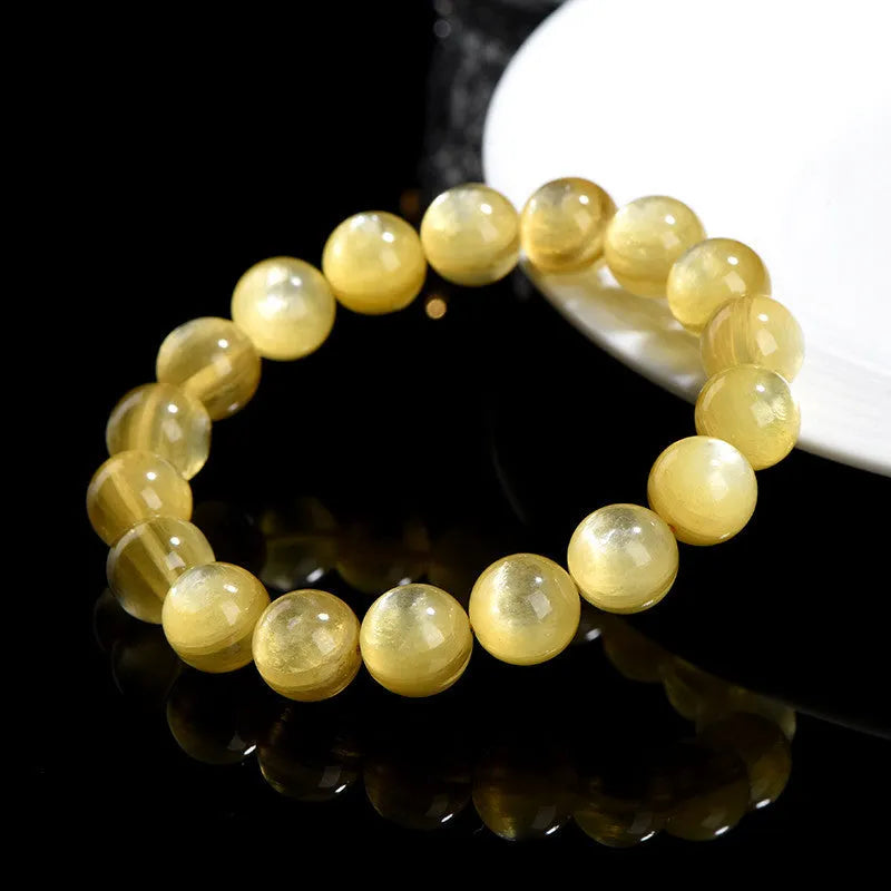 Yellow golden dragon mica round beads bracelet crafted from natural mica stone with a polished finish, featuring a unisex design and available in multiple bead sizes from 9mm to 18.8mm for custom sizing and personal style preferences
