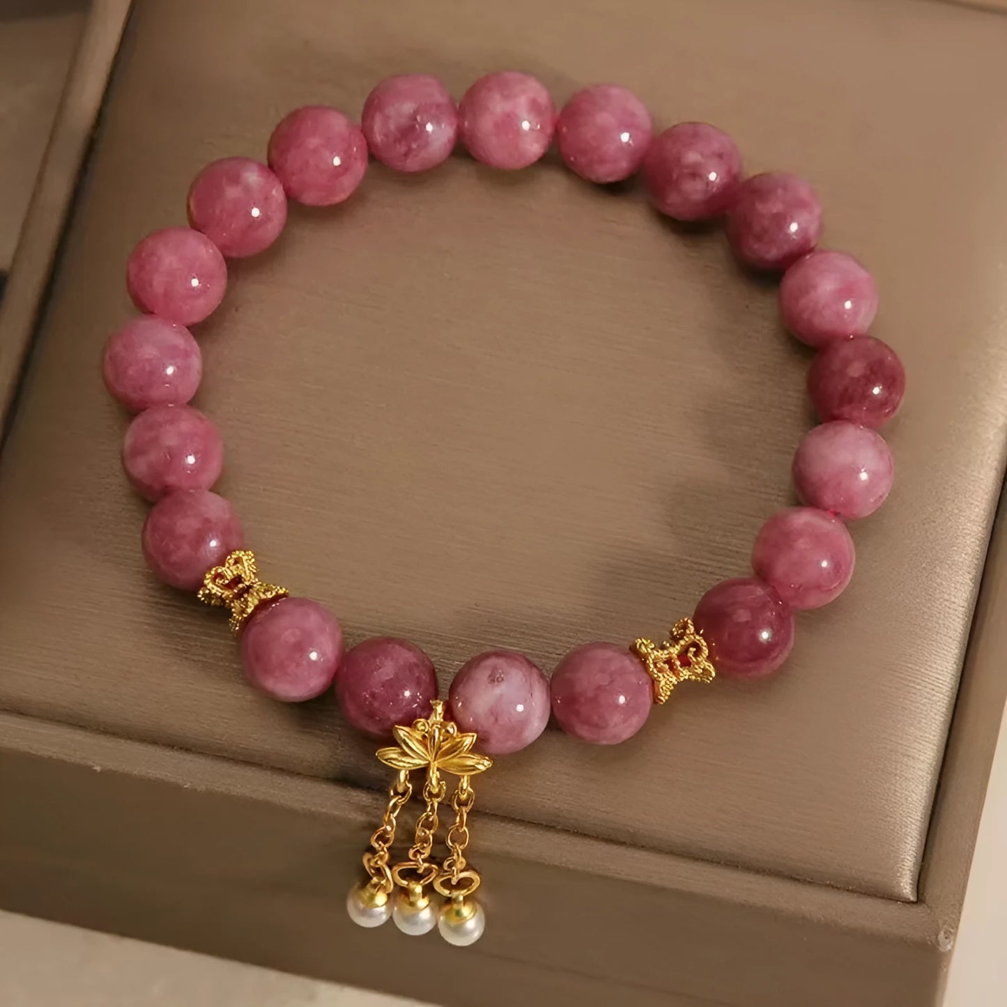 Pink lotus tassel natural stone bracelet with pearl pendant and flower charm.