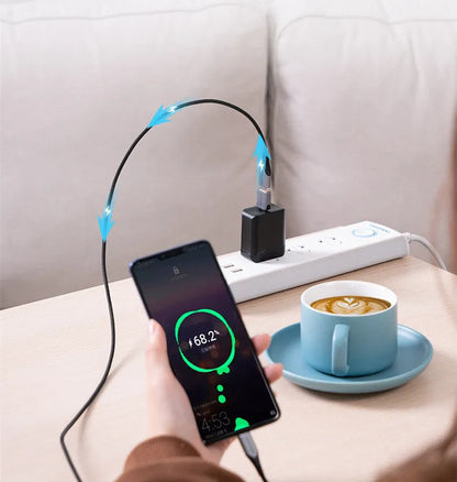 Grey aluminium alloy USB-C male to USB-A female OTG adapter with lanyard hole.
