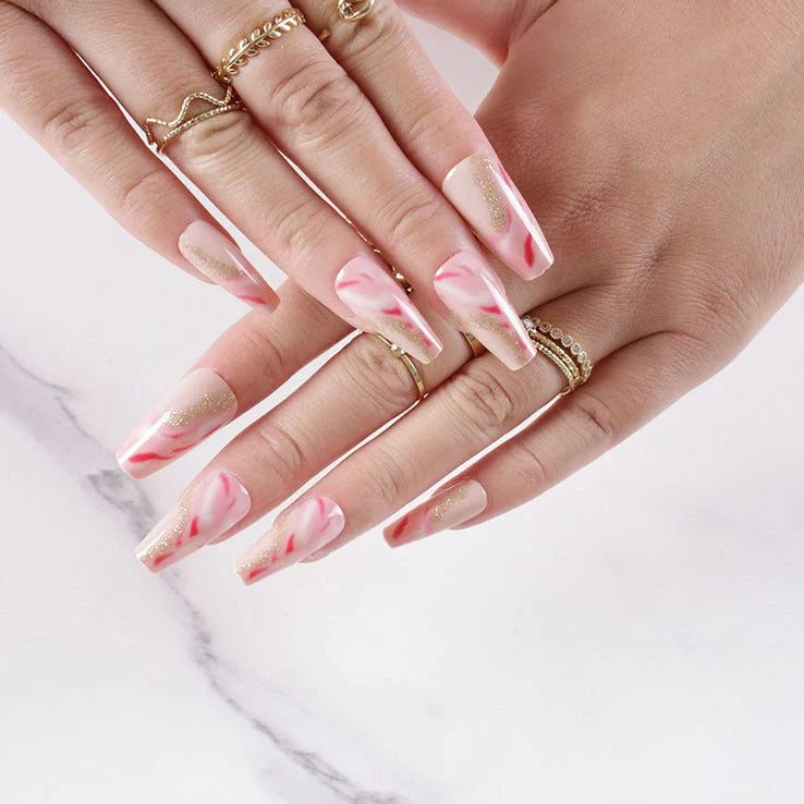 One Second Wearable Manicure set with 24 nail art pieces in rose, tulip, leopard print, and XINGX patterns