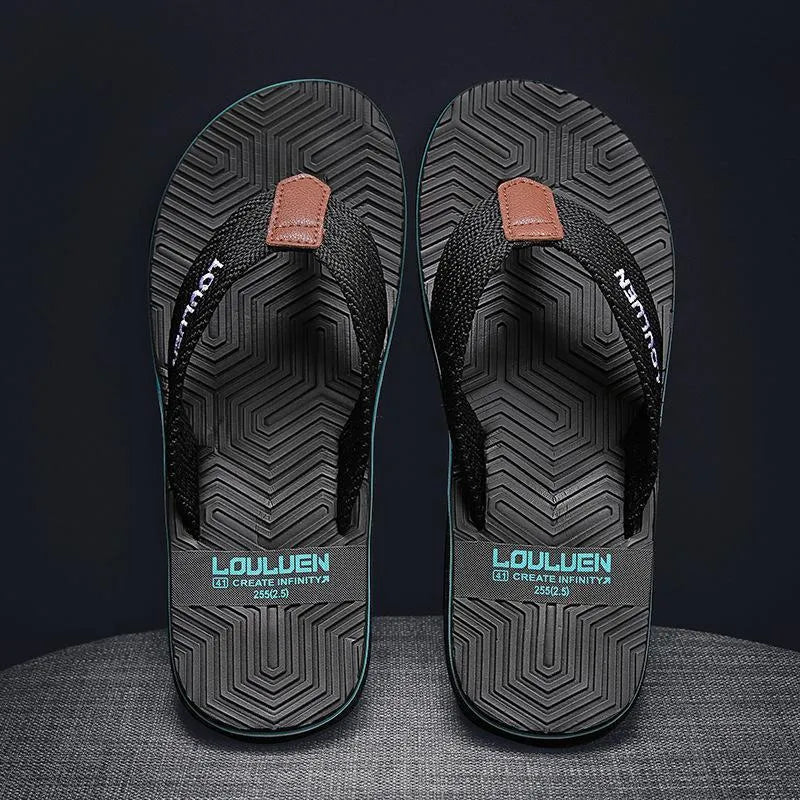 Men's black flip flops with a PVC sole and EVA upper on a plain background.