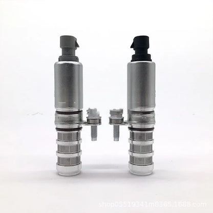 A pair of automotive oil control VVT solenoid valves for Buick and Chevrolet engines.