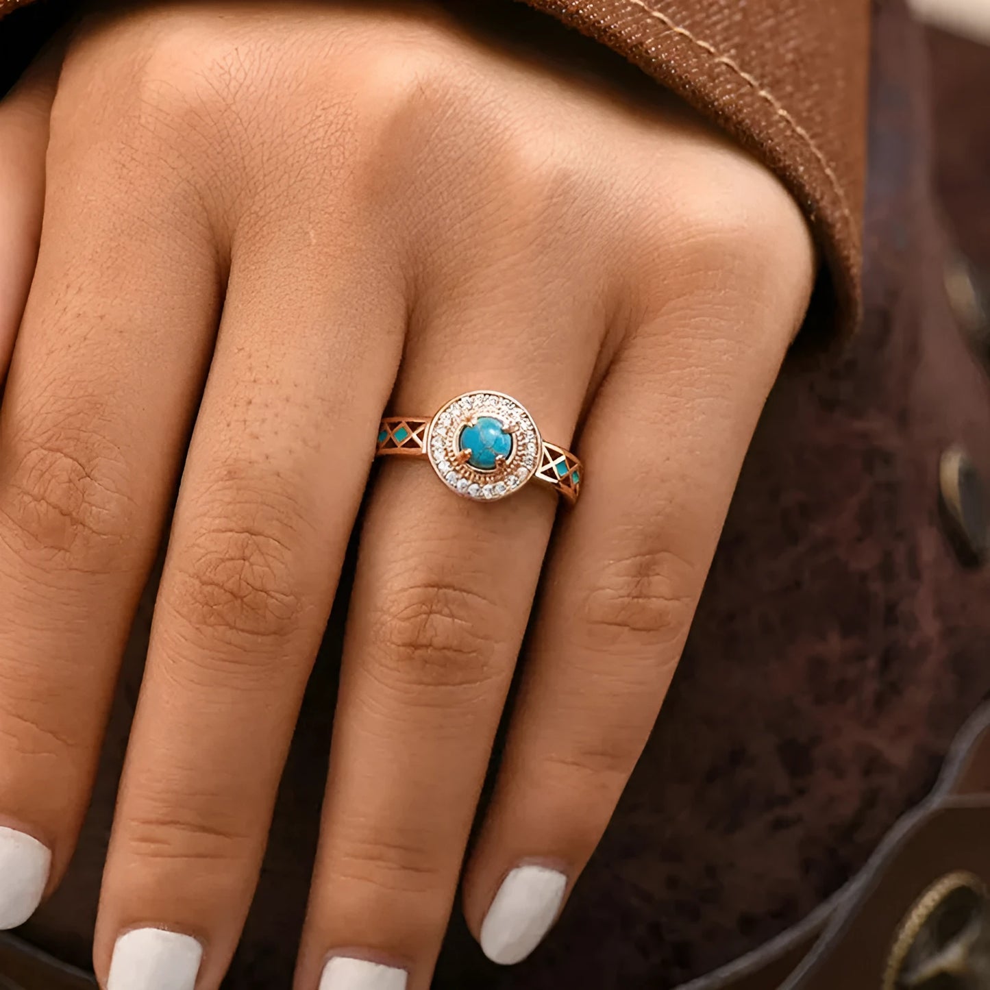 Rose gold copper women's ring with geometric design and inlaid turquoise zircon stones.