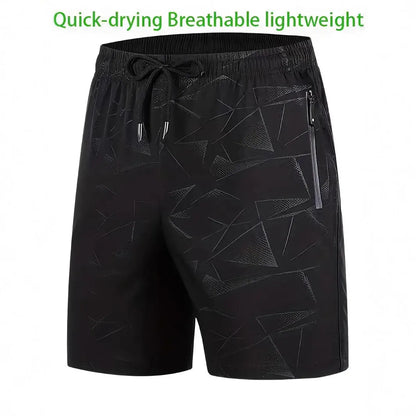 Man wearing loose-fit grey printed sports shorts with elastic waistband, showcasing the above-knee length.