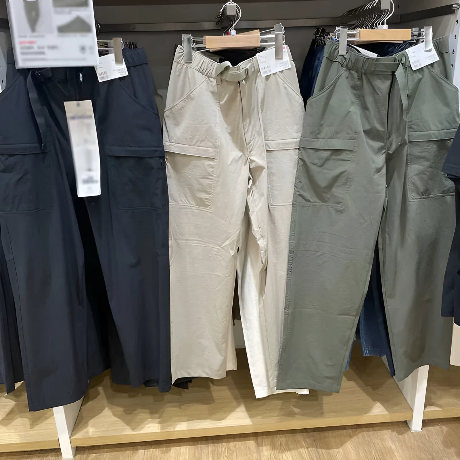 Men's straight leg work trousers in bamboo fibre fabric with micro elasticity stretch available in black, olive, and beige colours.