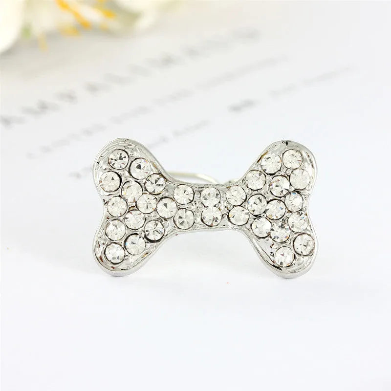 Rhinestone decorated dog bone shaped hair clip in alloy metal