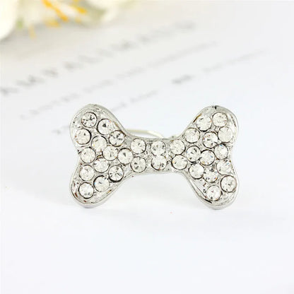 Rhinestone decorated dog bone shaped hair clip in alloy metal