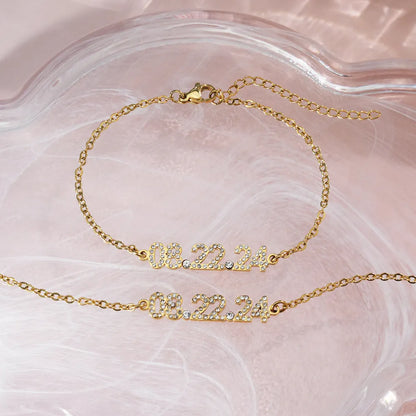 Stainless steel digital bracelet with diamond-set numbers on a wrist, showing gold, rose gold, and steel colour options.