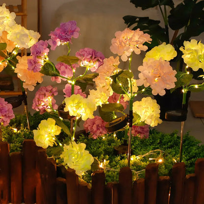 Solar powered hydrangea shaped garden floor light with rubber body in pink purple blue green or white
