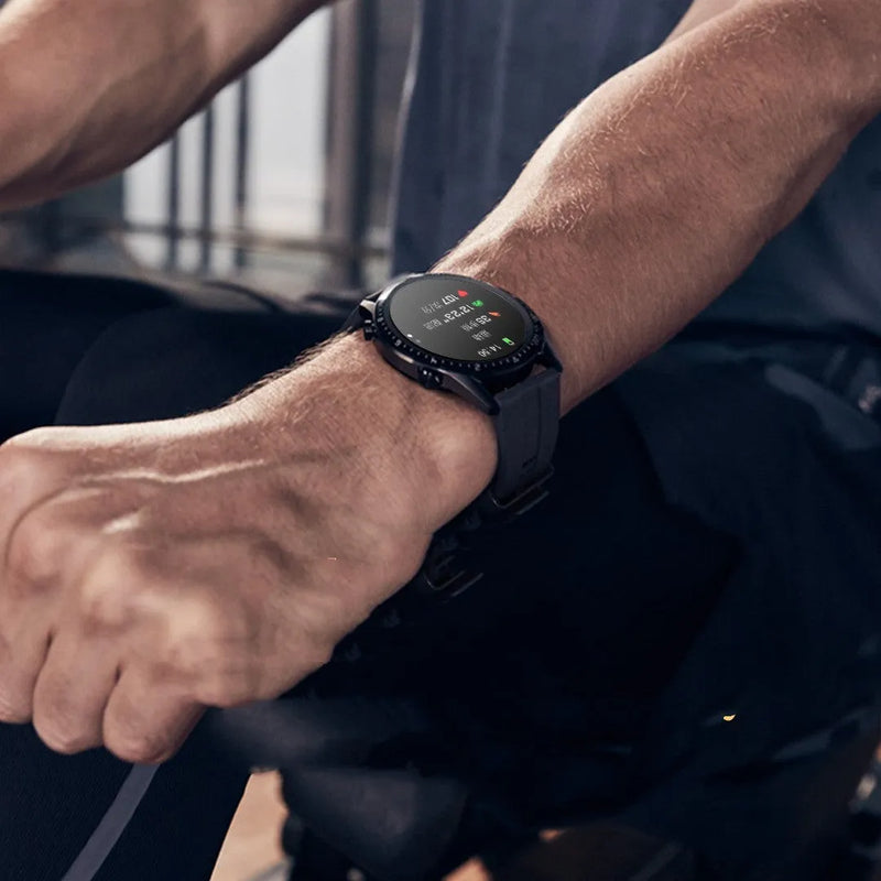 Round smartwatch with Bluetooth calling, aluminium alloy case, 46mm TFT screen, step counter, heart rate monitor, and smart notifications in black, dark brown, silver, or orange.