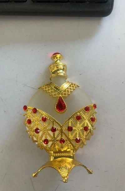 Captivating Perfume Oil in a decorative glass bottle, perfect for everyday fragrance needs