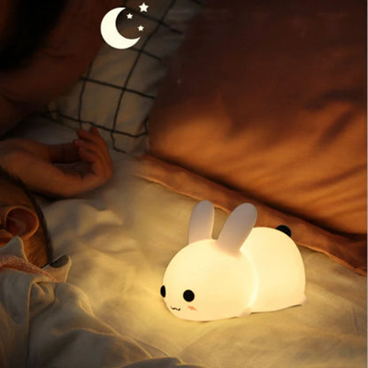 Rabbit-shaped silicone nightlight with warm amber and cool white dual colour illumination, perfect for bedside or home decor