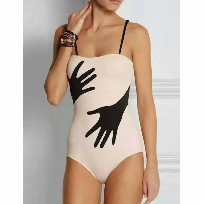 Women's one-piece bikini swimsuit with gauze skirt cover-up on beach
