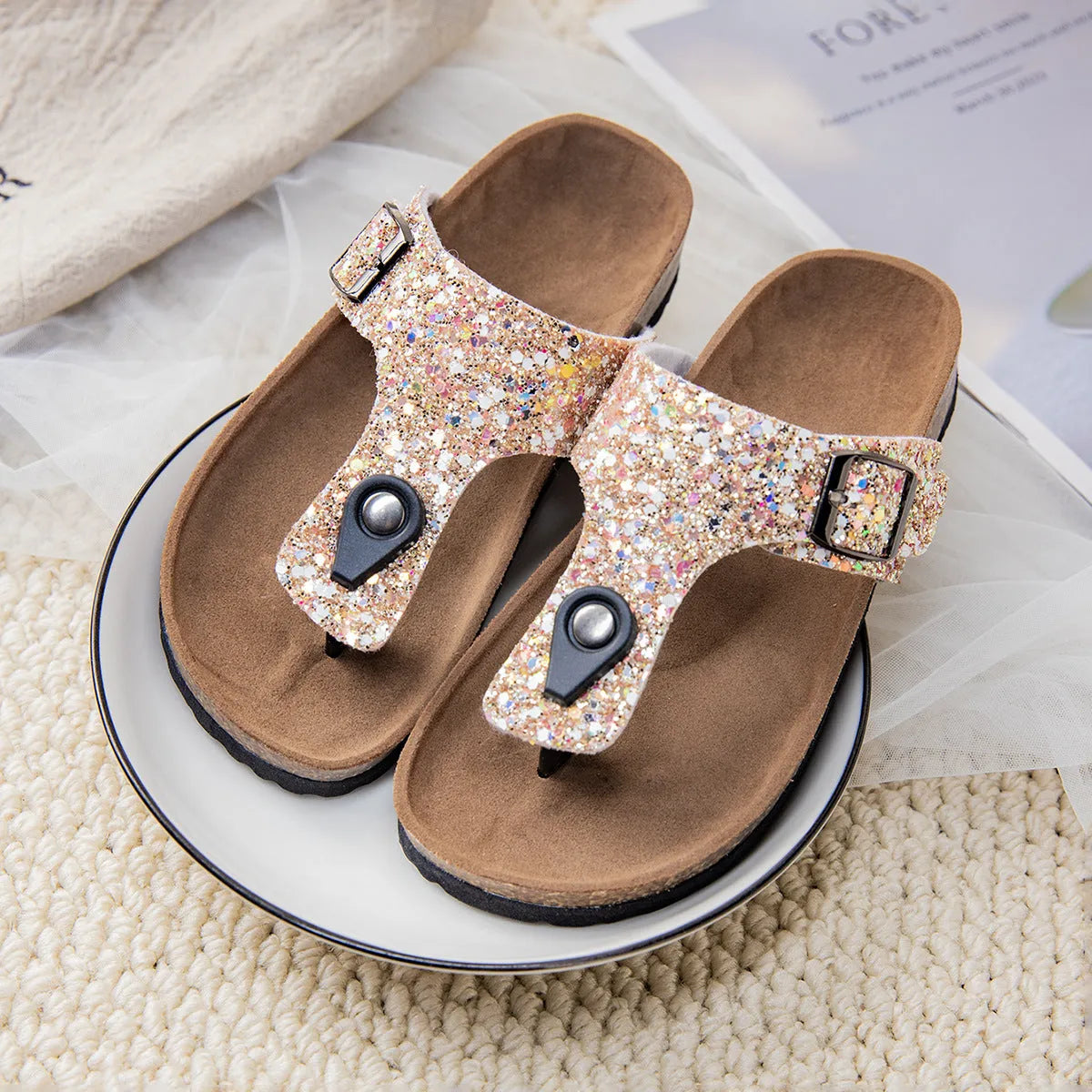 Cork flip-flops with frosted PVC sole and artificial leather upper in pink, silver, and gold colours