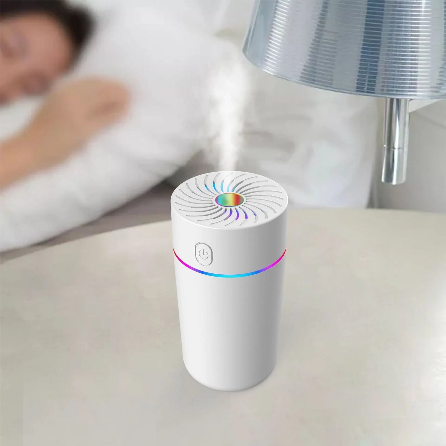 Compact car USB humidifier with aromatherapy function showing water reservoir and control buttons