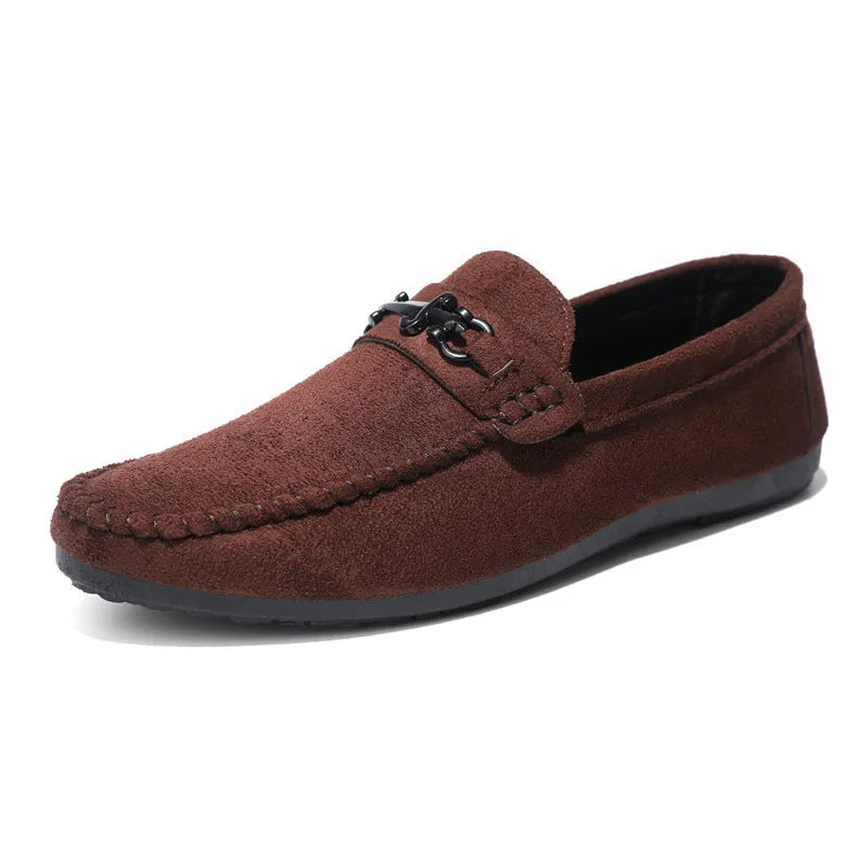Men's black waterproof slip-on loafers with round toe and low heel on a rubber sole.