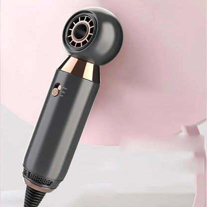 Compact leafless hair dryer with diffuser accessory, measuring 20cm with 800w power and ionic technology