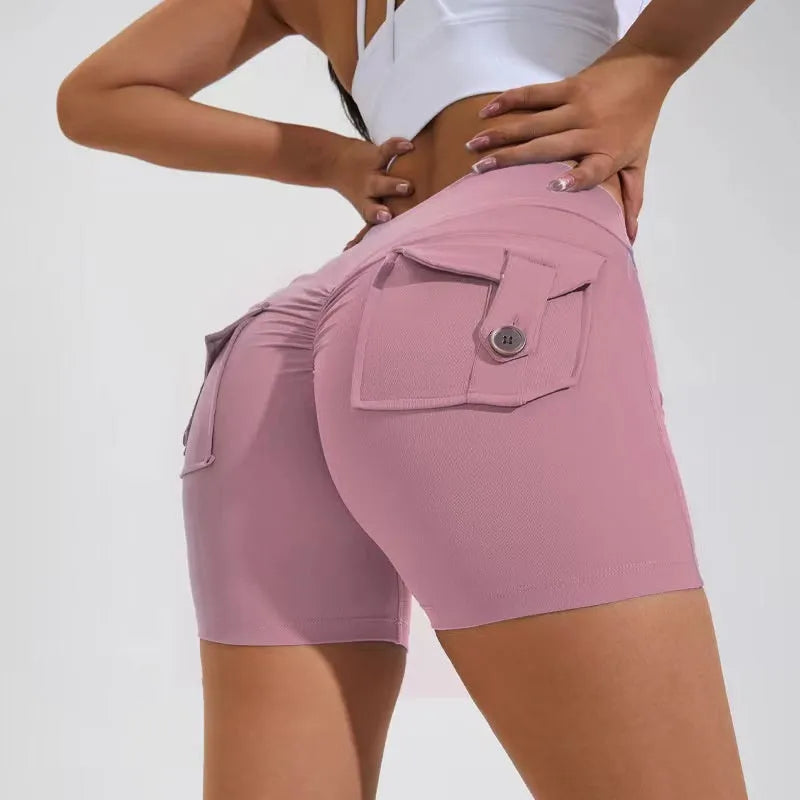 Women's high-waist quick-dry fitness shorts with side pockets in avocado green colour
