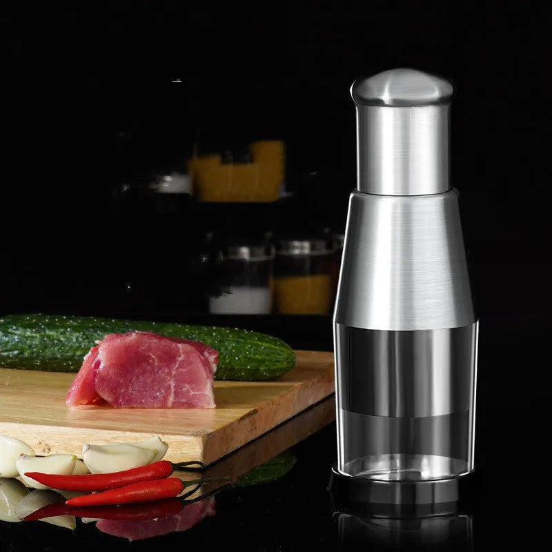 Black manual garlic press and onion chopper with stainless steel blades measuring 6x16cm