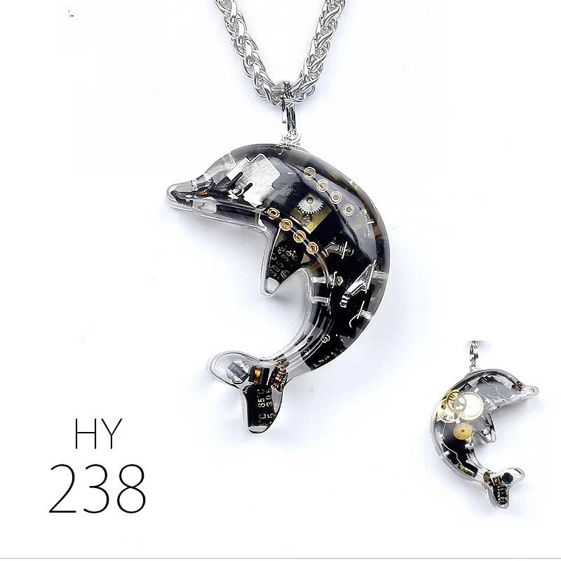Steampunk-inspired dolphin pendant necklace with electronic components and brass accents