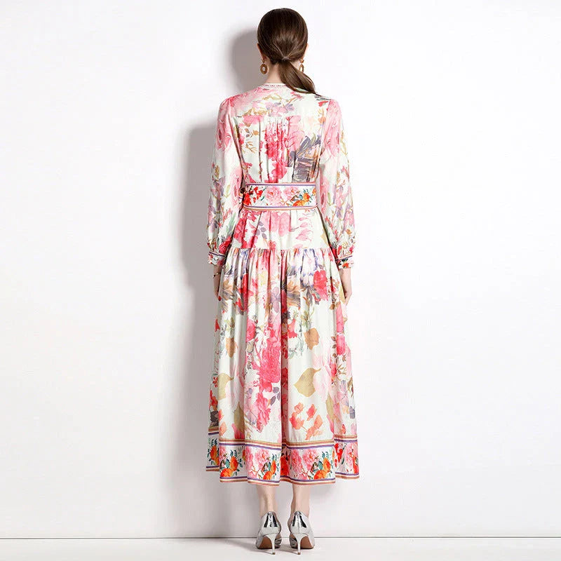 Elegant floral single-breasted swing dress with delicate print, tailored design, and flowing silhouette
