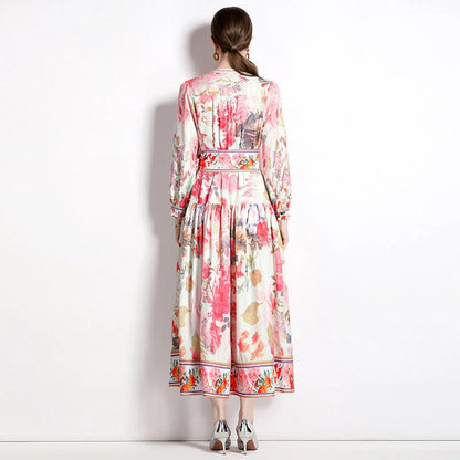 Elegant floral single-breasted swing dress with delicate print, tailored design, and flowing silhouette